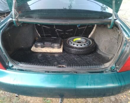 Зеленый Дэу Нубира, объемом двигателя 1.6 л и пробегом 204 тыс. км за 2700 $, фото 4 на Automoto.ua