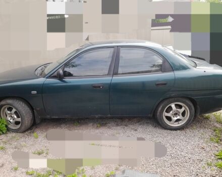 Зеленый Дэу Нубира, объемом двигателя 1.6 л и пробегом 335 тыс. км за 1150 $, фото 1 на Automoto.ua