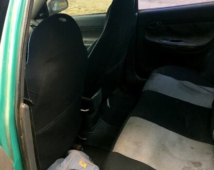 Зеленый Дэу Нубира, объемом двигателя 1.6 л и пробегом 300 тыс. км за 1500 $, фото 4 на Automoto.ua