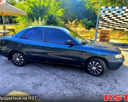 Зелений Деу Нубіра, об'ємом двигуна 1.6 л та пробігом 247 тис. км за 1950 $, фото 1 на Automoto.ua