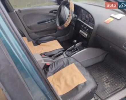 Зеленый Дэу Нубира, объемом двигателя 2 л и пробегом 230 тыс. км за 2700 $, фото 4 на Automoto.ua