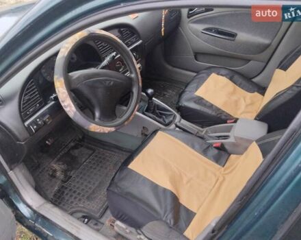 Зеленый Дэу Нубира, объемом двигателя 2 л и пробегом 230 тыс. км за 2700 $, фото 3 на Automoto.ua