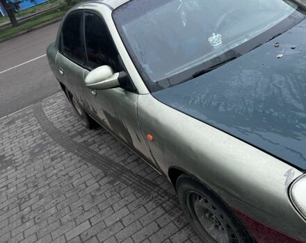 Зеленый Дэу Нубира, объемом двигателя 2 л и пробегом 317 тыс. км за 1800 $, фото 5 на Automoto.ua