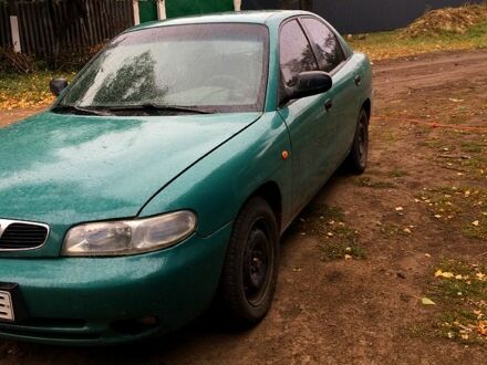 Зеленый Дэу Нубира, объемом двигателя 1.6 л и пробегом 300 тыс. км за 1500 $, фото 1 на Automoto.ua