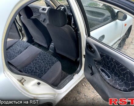 Білий Деу Сенс, об'ємом двигуна 1.3 л та пробігом 250 тис. км за 1250 $, фото 6 на Automoto.ua
