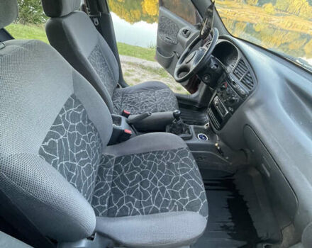 Деу Сенс 2004 у Вінниці на Automoto.ua Чорний Деу Сенс, об'ємом двигуна 1.3 л та пробігом 225 тис. км за 2000 $, фото 10 на Automoto.ua