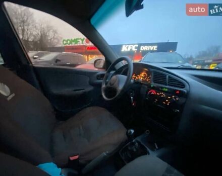 Чорний Деу Сенс, об'ємом двигуна 1.35 л та пробігом 345 тис. км за 1699 $, фото 9 на Automoto.ua