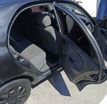 Черный Дэу Сенс, объемом двигателя 1.3 л и пробегом 135 тыс. км за 1100 $, фото 4 на Automoto.ua
