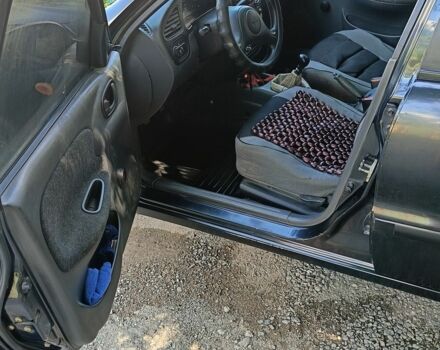 Черный Дэу Сенс, объемом двигателя 1.3 л и пробегом 386 тыс. км за 1700 $, фото 7 на Automoto.ua