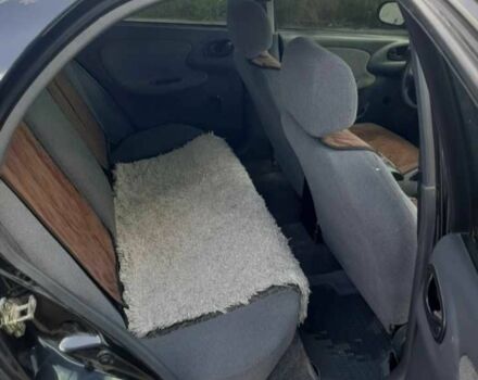 Чорний Деу Сенс, об'ємом двигуна 1.3 л та пробігом 188 тис. км за 2000 $, фото 6 на Automoto.ua