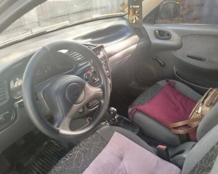 Черный Дэу Сенс, объемом двигателя 1.3 л и пробегом 286 тыс. км за 3000 $, фото 2 на Automoto.ua