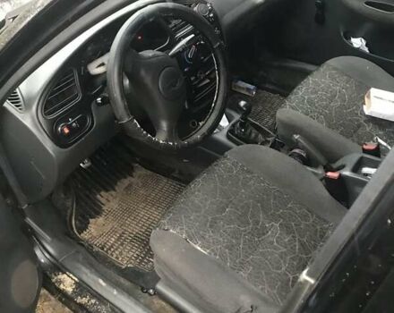 Чорний Деу Сенс, об'ємом двигуна 1.3 л та пробігом 200 тис. км за 2050 $, фото 1 на Automoto.ua