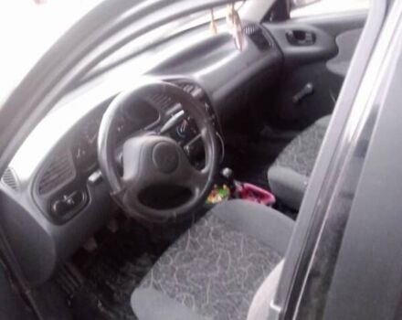 Чорний Деу Сенс, об'ємом двигуна 1.3 л та пробігом 150 тис. км за 1800 $, фото 3 на Automoto.ua