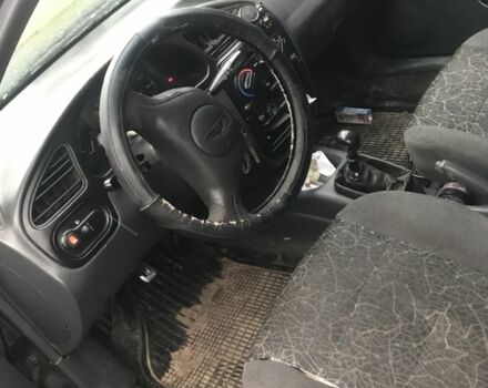 Чорний Деу Сенс, об'ємом двигуна 1.3 л та пробігом 200 тис. км за 2050 $, фото 1 на Automoto.ua