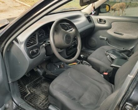 Черный Дэу Сенс, объемом двигателя 1.3 л и пробегом 236 тыс. км за 1400 $, фото 3 на Automoto.ua