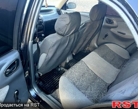 Черный Дэу Сенс, объемом двигателя 1.3 л и пробегом 140 тыс. км за 1100 $, фото 6 на Automoto.ua
