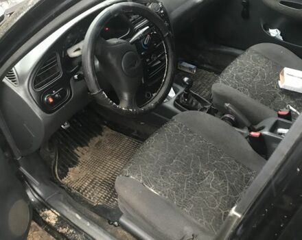 Чорний Деу Сенс, об'ємом двигуна 1.3 л та пробігом 200 тис. км за 2050 $, фото 3 на Automoto.ua