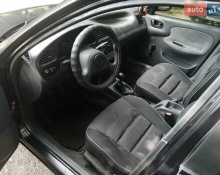 Черный Дэу Сенс, объемом двигателя 1.3 л и пробегом 265 тыс. км за 1500 $, фото 8 на Automoto.ua