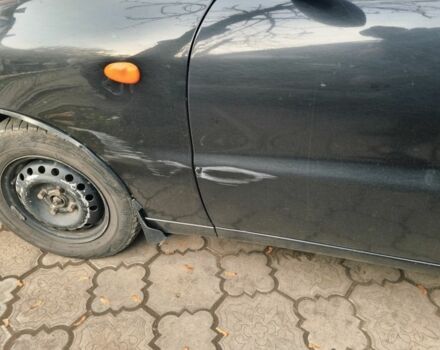 Черный Дэу Сенс, объемом двигателя 1.3 л и пробегом 236 тыс. км за 1400 $, фото 4 на Automoto.ua