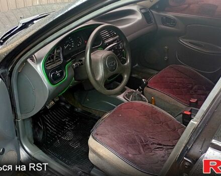 Чорний Деу Сенс, об'ємом двигуна 1.3 л та пробігом 220 тис. км за 1999 $, фото 4 на Automoto.ua