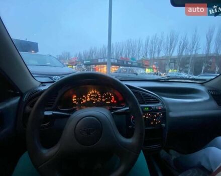 Чорний Деу Сенс, об'ємом двигуна 1.35 л та пробігом 345 тис. км за 1699 $, фото 7 на Automoto.ua