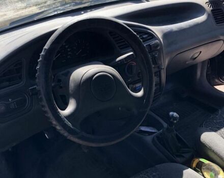 Черный Дэу Сенс, объемом двигателя 1.5 л и пробегом 128 тыс. км за 1781 $, фото 4 на Automoto.ua