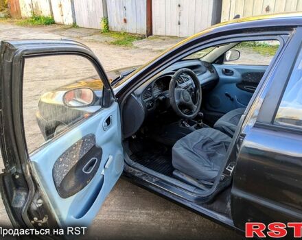Черный Дэу Сенс, объемом двигателя 1.3 л и пробегом 230 тыс. км за 1250 $, фото 3 на Automoto.ua