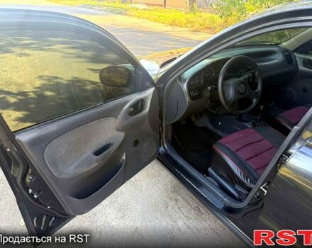 Черный Дэу Сенс, объемом двигателя 1.3 л и пробегом 268 тыс. км за 1550 $, фото 5 на Automoto.ua