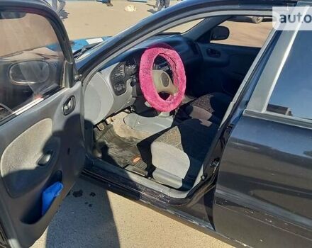 Черный Дэу Сенс, объемом двигателя 1.3 л и пробегом 170 тыс. км за 1500 $, фото 5 на Automoto.ua