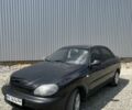 Черный Дэу Сенс, объемом двигателя 1.5 л и пробегом 260 тыс. км за 2100 $, фото 1 на Automoto.ua