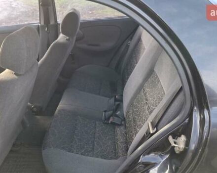 Черный Дэу Сенс, объемом двигателя 1.3 л и пробегом 454 тыс. км за 900 $, фото 4 на Automoto.ua