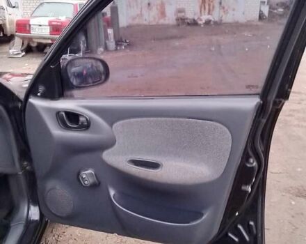 Черный Дэу Сенс, объемом двигателя 1.3 л и пробегом 238 тыс. км за 1800 $, фото 2 на Automoto.ua