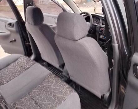 Черный Дэу Сенс, объемом двигателя 1.3 л и пробегом 238 тыс. км за 1800 $, фото 4 на Automoto.ua