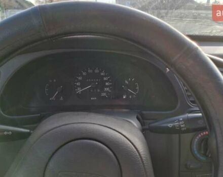 Черный Дэу Сенс, объемом двигателя 1.3 л и пробегом 454 тыс. км за 900 $, фото 1 на Automoto.ua