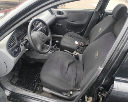 Черный Дэу Сенс, объемом двигателя 1.5 л и пробегом 204 тыс. км за 1000 $, фото 2 на Automoto.ua