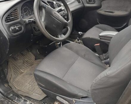 Чорний Деу Сенс, об'ємом двигуна 1.6 л та пробігом 230 тис. км за 2000 $, фото 1 на Automoto.ua