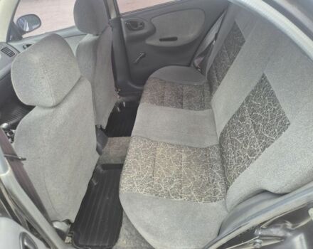 Черный Дэу Сенс, объемом двигателя 1.4 л и пробегом 177 тыс. км за 1500 $, фото 6 на Automoto.ua