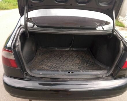 Чорний Деу Сенс, об'ємом двигуна 1.5 л та пробігом 230 тис. км за 2000 $, фото 4 на Automoto.ua