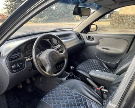 Черный Дэу Сенс, объемом двигателя 1.5 л и пробегом 156 тыс. км за 3200 $, фото 11 на Automoto.ua