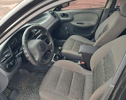 Черный Дэу Сенс, объемом двигателя 1.4 л и пробегом 100 тыс. км за 2000 $, фото 10 на Automoto.ua