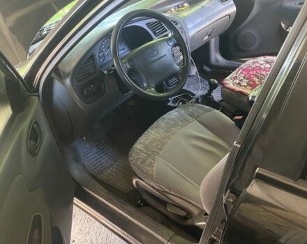 Черный Дэу Сенс, объемом двигателя 1.6 л и пробегом 327 тыс. км за 1600 $, фото 17 на Automoto.ua