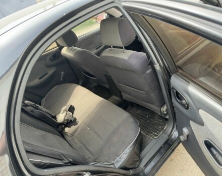 Чорний Деу Сенс, об'ємом двигуна 1.3 л та пробігом 318 тис. км за 1750 $, фото 3 на Automoto.ua