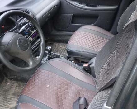 Черный Дэу Сенс, объемом двигателя 1.5 л и пробегом 111 тыс. км за 1650 $, фото 3 на Automoto.ua