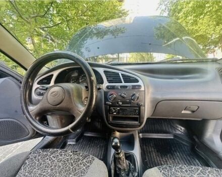 Черный Дэу Сенс, объемом двигателя 1.3 л и пробегом 200 тыс. км за 2500 $, фото 2 на Automoto.ua