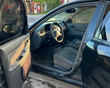 Черный Дэу Сенс, объемом двигателя 1.5 л и пробегом 243 тыс. км за 2300 $, фото 3 на Automoto.ua