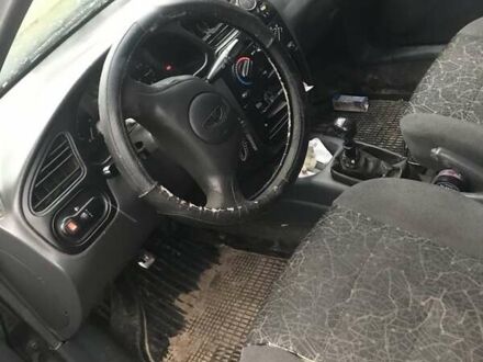 Чорний Деу Сенс, об'ємом двигуна 1.3 л та пробігом 200 тис. км за 2050 $, фото 1 на Automoto.ua