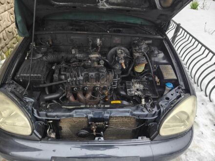 Чорний Деу Сенс, об'ємом двигуна 1.5 л та пробігом 250 тис. км за 698 $, фото 1 на Automoto.ua