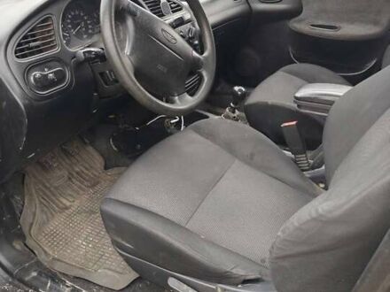 Черный Дэу Сенс, объемом двигателя 1.6 л и пробегом 230 тыс. км за 2000 $, фото 1 на Automoto.ua