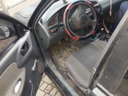 Черный Дэу Сенс, объемом двигателя 1.4 л и пробегом 320 тыс. км за 1500 $, фото 1 на Automoto.ua