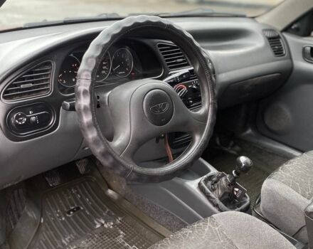 Красный Дэу Сенс, объемом двигателя 1.5 л и пробегом 350 тыс. км за 1399 $, фото 4 на Automoto.ua